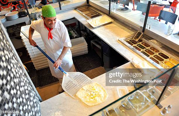 La Forchetta's Panetta Giuseppe making a white pizza on April 12, 2012 in Washington, DC.