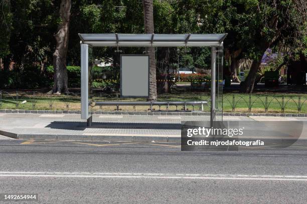 bus stop shelter with blank space - bus shelter poster stock-fotos und bilder