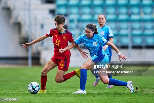 Pau of Spain competes with Laila Harbert of England during the UEFA Women's European Under-17 Championship Semi-Final match between Spain and England...
