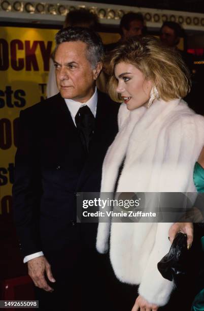 Tony Curtis and Jill Vandenberg Curtis attend an event, United States, circa 1990s.