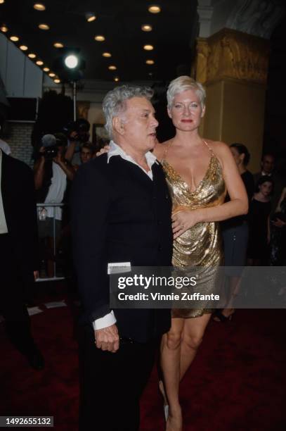 Tony Curtis and wife Jill Vandenberg Curtis attend the "Halloween H20: 20 Years Later" Premiere at Mann Village Theatre in Westwood, California,...