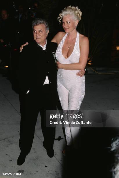 Tony Curtis and girlfriend Jill at the 69th annual Academy Awards after party at Mortons restaurant in Beverly Hills, California, United States, 24th...