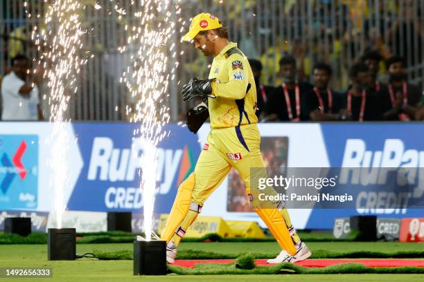 Mahendra Singh Dhoni of Chennai Super Kings walks onto the pitch to field during the IPL Qualifier match between Gujarat Titans and Chennai Super...