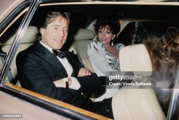 Bill Wiggins and Joan Collins during Swifty Lazar's Oscar Party at Spago's in Hollywood, California, United States, 30th March 1987.