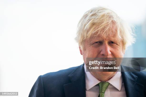 Former UK Prime Minister Boris Johnson looks on during a tour after a meeting with Gov. Greg Abbott at the Texas State Capitol on May 23, 2023 in...