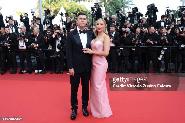 Colin Jost and Scarlett Johansson attend the "Asteroid City" red carpet during the 76th annual Cannes film festival at Palais des Festivals on May...