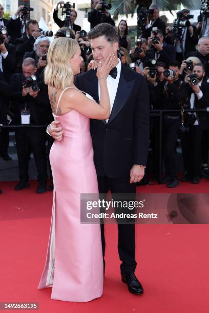 Scarlett Johansson and Colin Jost attend the "Asteroid City" red carpet during the 76th annual Cannes film festival at Palais des Festivals on May...