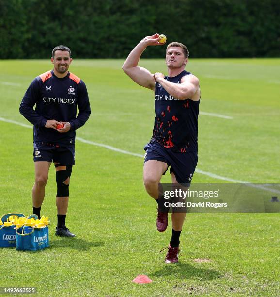 Owen Farrell bowls the ball during a game of cricket during the warm up prior to the Saracens training session held on May 23, 2023 in St Albans,...