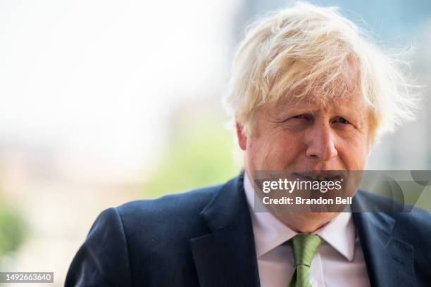 Former UK Prime Minister Boris Johnson looks on during a tour after a meeting with Gov. Greg Abbott at the Texas State Capitol on May 23, 2023 in...