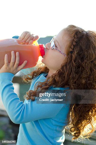 girl drinking cider - gallon stock pictures, royalty-free photos & images