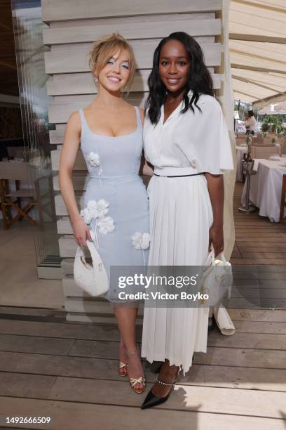 Sydney Sweeney and Aja Naomi King attend Miu Miu lunch hosted by Sydney Sweeney at l'Ecrin Plage during the 76th Cannes Film Festival on May 23, 2023...