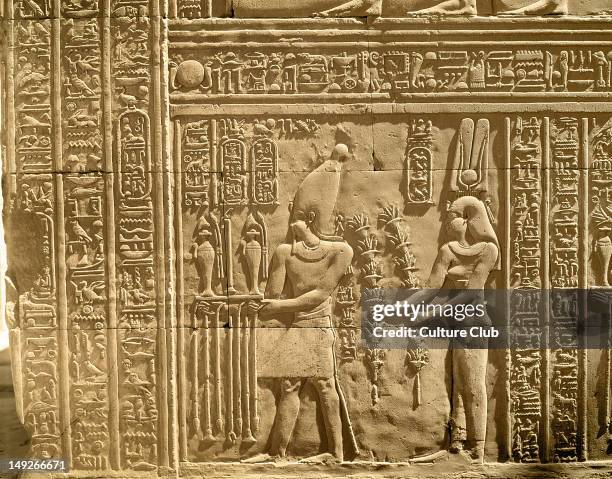 Relief depicting Ptolemy VIII Euergetes II and Cleopatra III making offerings to the gods