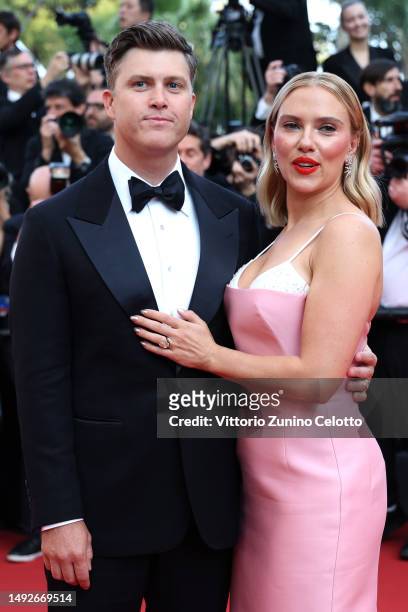 Colin Jost and Scarlett Johansson attend the "Asteroid City" red carpet during the 76th annual Cannes film festival at Palais des Festivals on May...