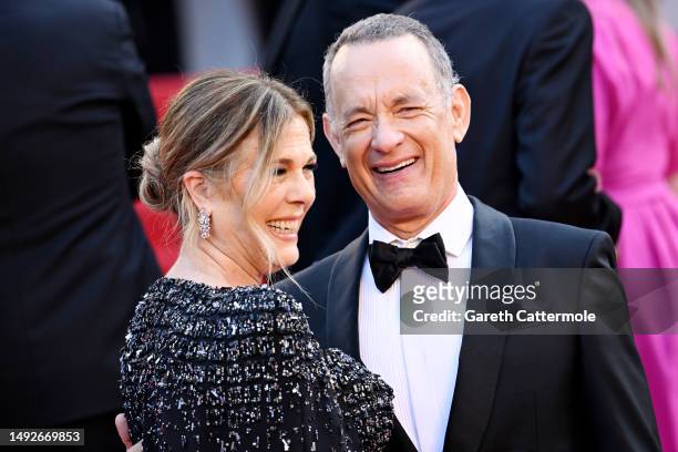 Rita Wilson and Tom Hanks attend the "Asteroid City" red carpet during the 76th annual Cannes film festival at Palais des Festivals on May 23, 2023...