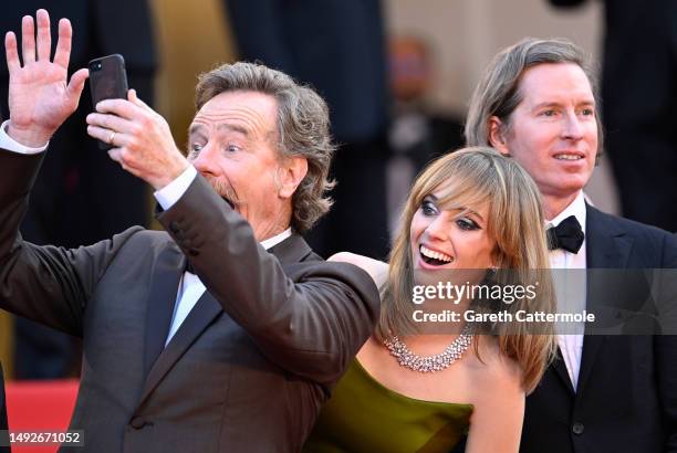 Bryan Cranston, Maya Hawke and Director Wes Anderson attend the "Asteroid City" red carpet during the 76th annual Cannes film festival at Palais des...