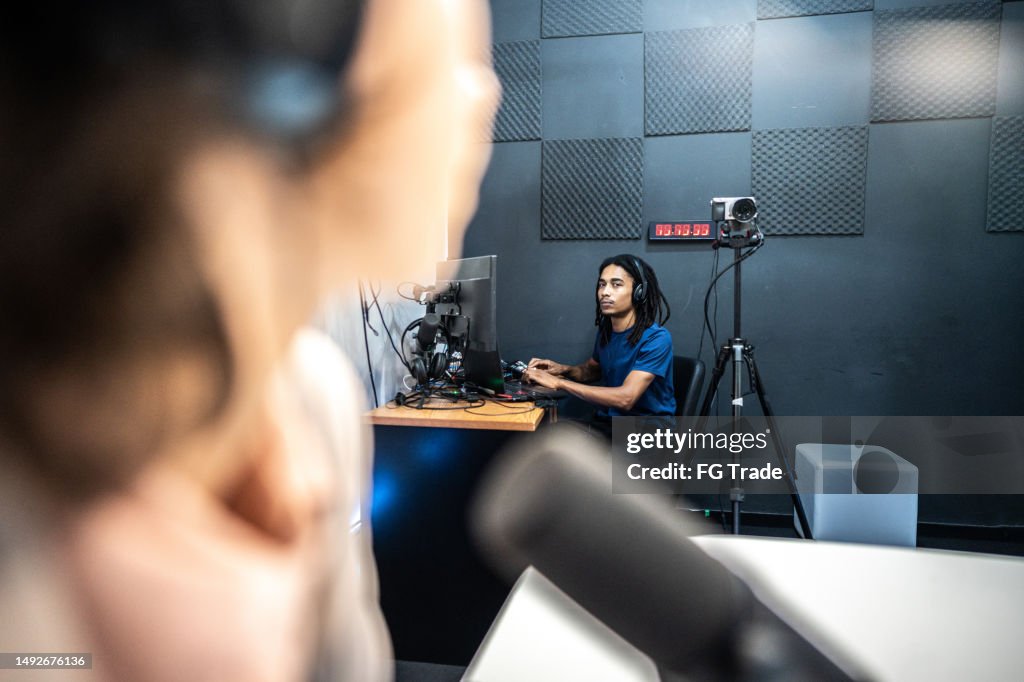 Young editor or producer during the recording of an online show