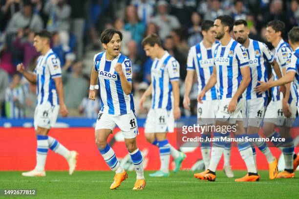 Takefusa Kubo of Real Sociedad celebrates with teammates after scoring the team's first goal during the LaLiga Santander match between Real Sociedad...
