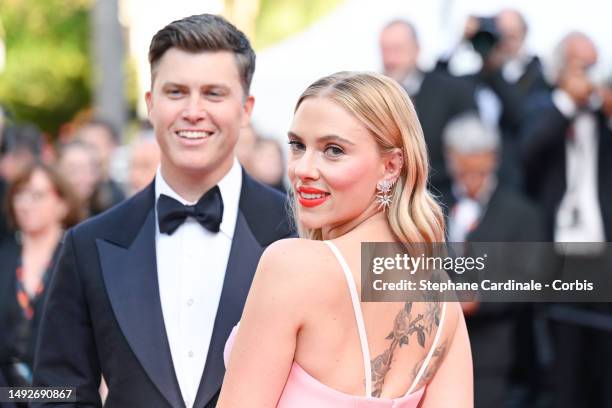 Colin Jost and Scarlett Johansson attend the "Asteroid City" red carpet during the 76th annual Cannes film festival at Palais des Festivals on May...