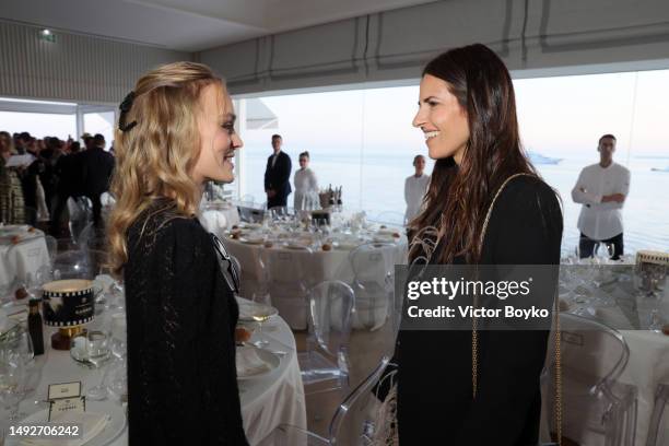 Lily-Rose Depp and Ashley Levinson attend the Cannes Film Festival Air Mail Party at Hotel du Cap-Eden-Roc on May 23, 2023 in Cap d'Antibes, France.