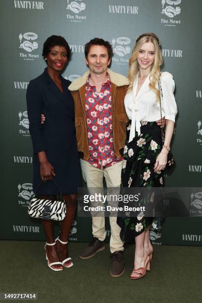 Guest, Matt Bellamy and Elle Evans attend a party hosted by Vanity Fair and The Newt to celebrate the RHS Chelsea Flower Show on May 23, 2023 in...