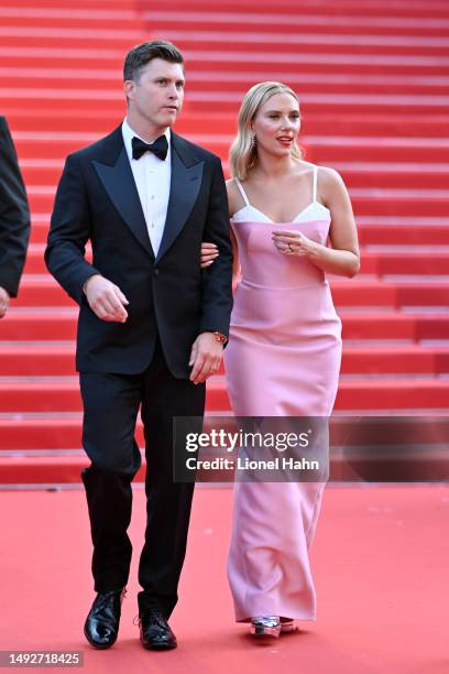 Colin Jost and Scarlett Johansson attend the "Asteroid City" red carpet during the 76th annual Cannes film festival at Palais des Festivals on May...