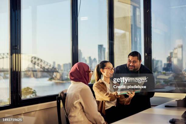 multicultural professionals driving innovation in sydney's office environment - multiculturalismo stock pictures, royalty-free photos & images