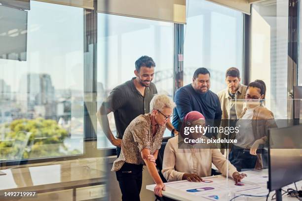 a multicultural team of professionals fostering collaboration and innovation in sydney. - multiculturalism stock pictures, royalty-free photos & images