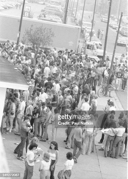View of the crowd lined up outside at Comiskey Park during an anti-disco promotion, Chicago, Illinois, July 12, 1979. The event, held between games...