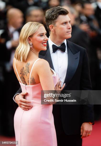 Colin Jost and Scarlett Johansson attend the "Asteroid City" red carpet during the 76th annual Cannes film festival at Palais des Festivals on May...