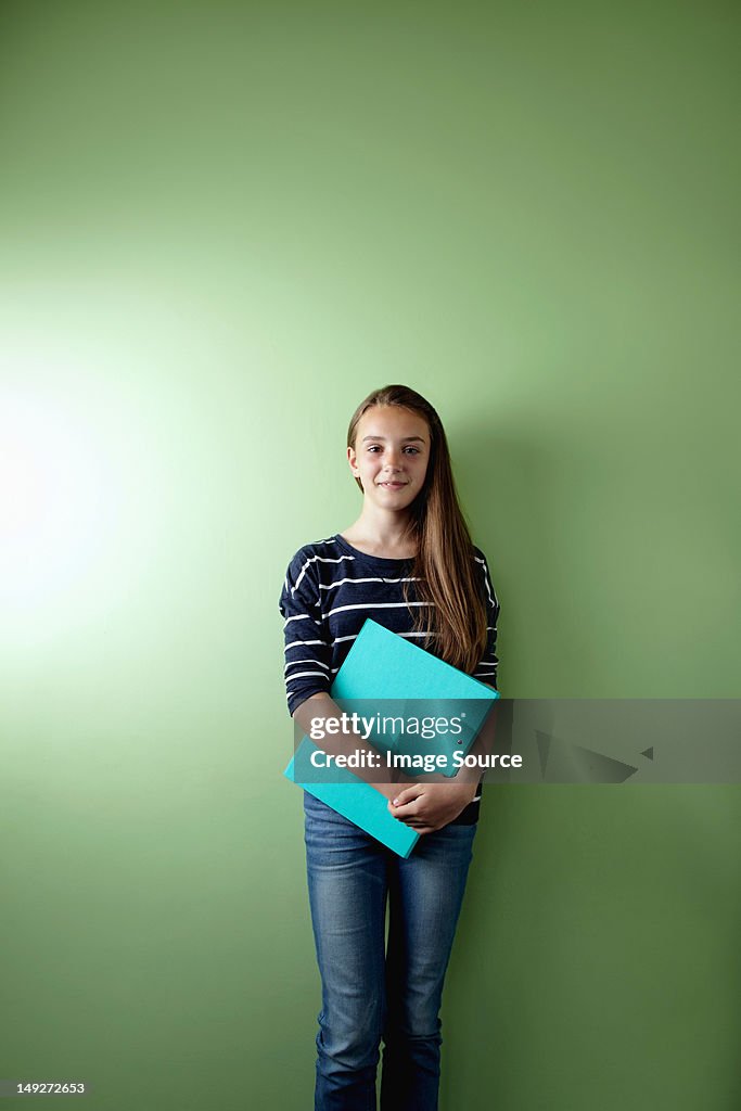 Schoolgirl with ringbinder