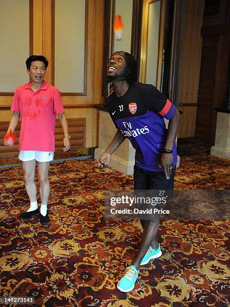 Gervinho of Arsenal FC have a demonstration of Jianzi in the St. Regis Hotel in Beijing during their pre-season Asian Tour in China on July 26 2012...