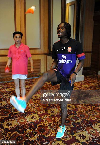 Gervinho of Arsenal FC have a demonstration of Jianzi in the St. Regis Hotel in Beijing during their pre-season Asian Tour in China on July 26 2012...