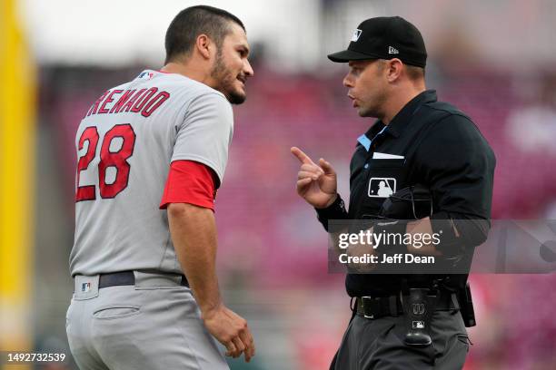 Nolan Arenado of the St. Louis Cardinals reacts after being thrown out of the game by home plate umpire Will Little during the third inning of a...