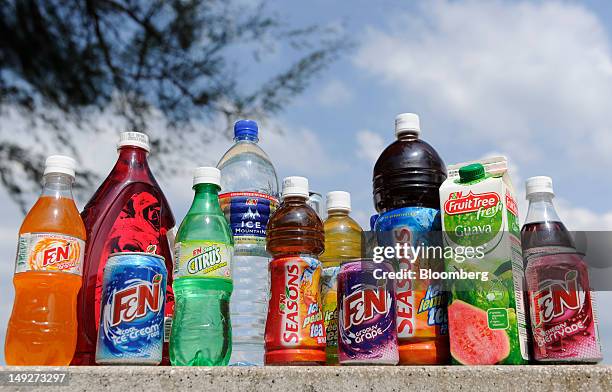 Range of Fraser & Neave Ltd. Products are arranged for a photograph in Singapore, on Thursday, July 26, 2012. Kirin Holdings Co., Japan's largest...