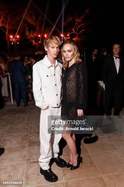Lily-Rose Depp and Troye Sivan attends the Cannes Film Festival Air Mail /Warner Brothers Discovery Party at Hotel du Cap-Eden-Roc on May 23, 2023 in...