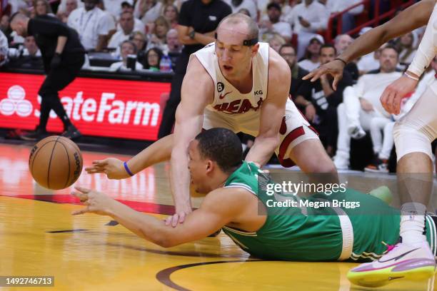 Grant Williams of the Boston Celtics battles against Cody Zeller of the Miami Heat during the first quarter in game four of the Eastern Conference...