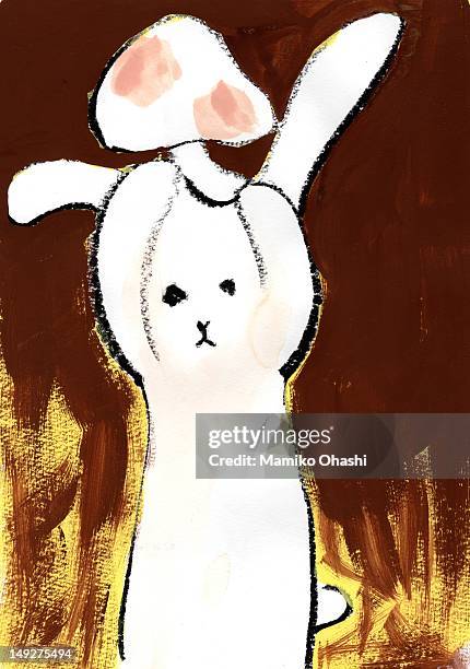 a bunny holding a mushroom over his head - pilzkopf stock-grafiken, -clipart, -cartoons und -symbole