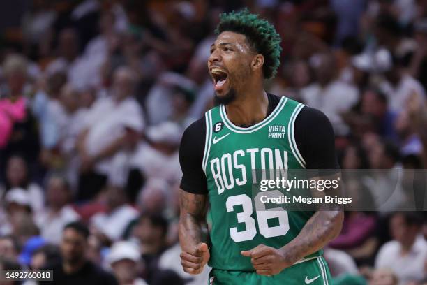 Marcus Smart of the Boston Celtics reacts after a basket against the Miami Heat during the third quarter in game four of the Eastern Conference...