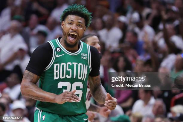 Marcus Smart of the Boston Celtics reacts after a basket against the Miami Heat during the third quarter in game four of the Eastern Conference...