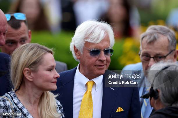 Trainer Bob Baffert celebrates in the winners circle with his wife Jill after his horse National Treasure won the 148th Running of the Preakness...