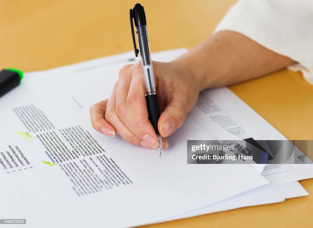 Note Write Thumb Hands Writing Notes On Document Closeup High-Res Stock Photo - Getty Images