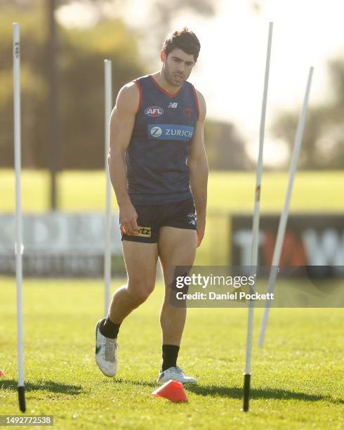 Christian Petracca of the Demons looks on during a Narrm Football Club / Melbourne Demons AFL training session at Casey Fields on May 24, 2023 in...