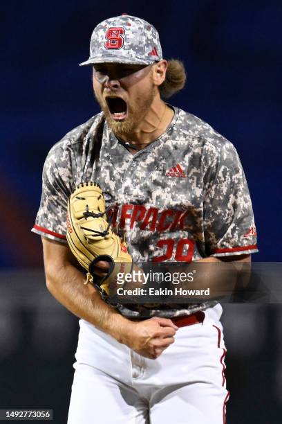 Logan Whitaker of the NC State Wolfpack celebrates his game winning strikeout against the Duke Blue Devils in the 11th inning during the ACC Baseball...