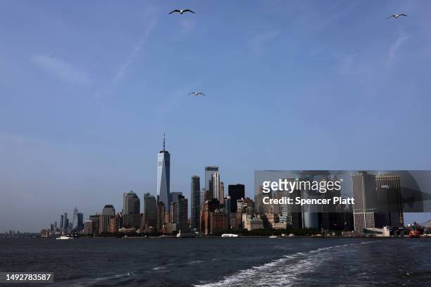 The Manhattan skyline is seen from the Staten Island Ferry on May 23, 2023 in New York City. In the new study published in the journal Earth’s...