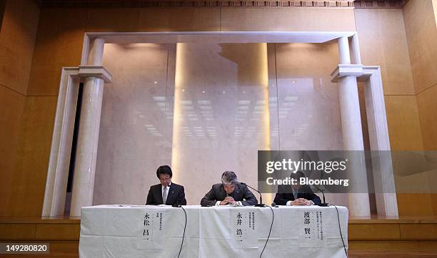 Shoichi Nagamatsu, executive officer of Nomura Securities Co., left, Koji Nagai, incoming president and chief executive officer of Nomura Holdings...