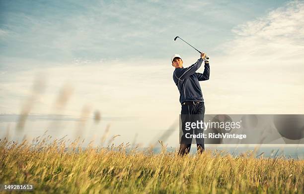 english green - golf swing stock pictures, royalty-free photos & images