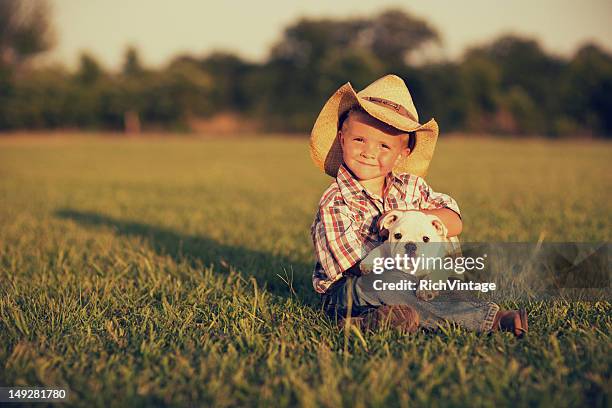 boy and his dog - mississippi v texas stockfoto's en -beelden