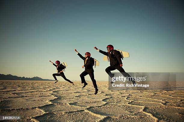 taking flight - three people stock pictures, royalty-free photos & images