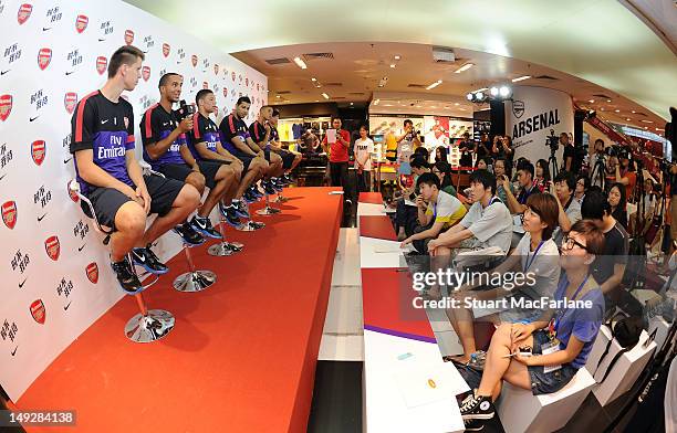 Wojciech Szczesny, Theo Walcott, Alex Oxlade-Chamberlain, Andre Santos, Kieran Gibbs and Ryo Miyaichi of Arsenal attends a Nike event in Beijing...