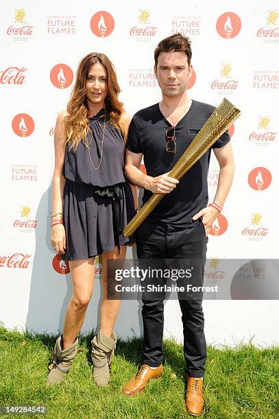 Lisa Snowdon and Dave Berry pose backstage at the London 2012 Olympic Torch Relay Finale Concert in London's Hyde Park, presented by Coca-Cola on...